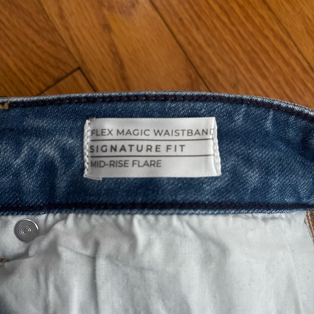 Lane Bryant Flare Distressed Blue Jeans - Picture 3 of 4